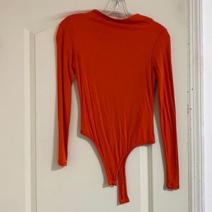 orange bodysuit